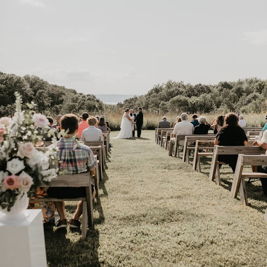 Open area outdoor wedding alter with river vue at Maidenwood Weddings and Events