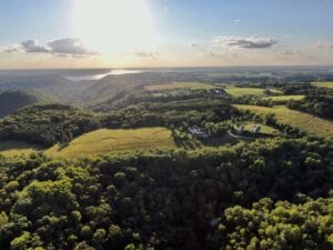 View from above our nature-inspired wedding venue with forest wedding and prairie wedding sites