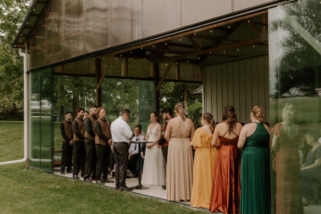Raining day ceremony backup in our glass enclosed pavilion. 