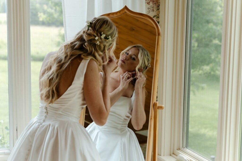Nature-inspired wedding venue getting ready suites with natural light for bride.
